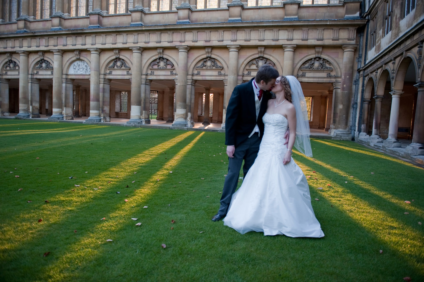 Destination wedding portrait in a French courtyard, MadlyWed bilingual coverage